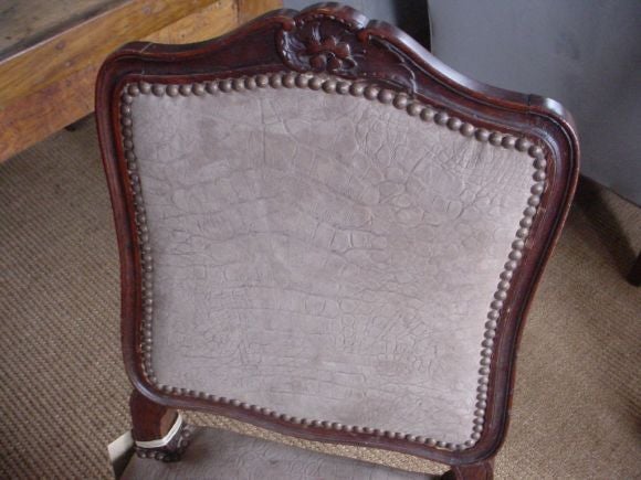 Set of 8 French Leather and Wood Carved Chairs