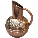 English, Aesthetic period embossed copper jug