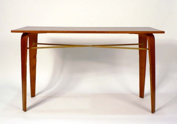A German console table designed for the University of Stutgart, having bent ash legs unified by an iron 
