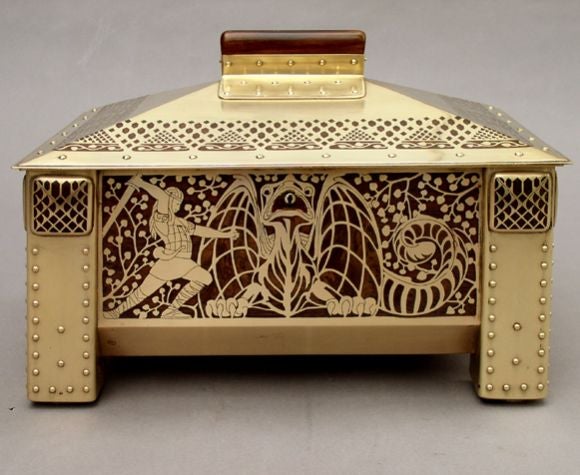 A large and exceptional box executed in brass inlaid with plaisander wood and made by Erhard and Son; the designs depicting Wagner's Siegfried legends.