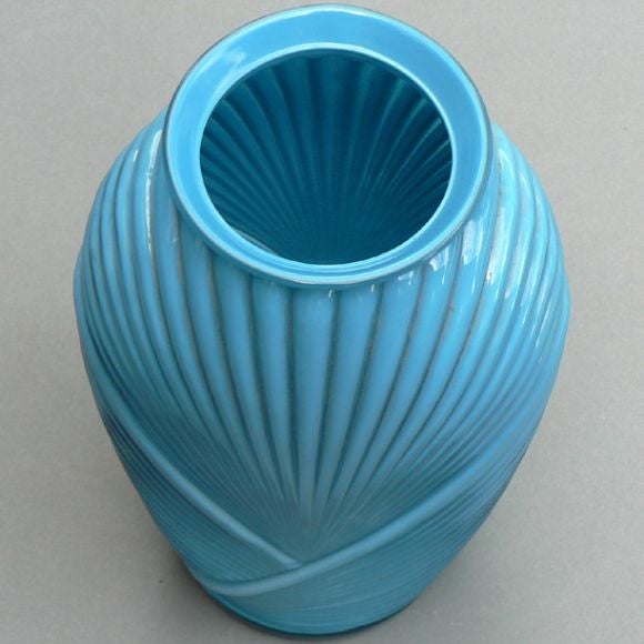 An unusual ribbed blue glass vase.