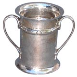 Antique An Arts and Crafts period two handled hammered surface vase.
