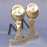 Antique English Arts and Crafts period brass fire tool rests.