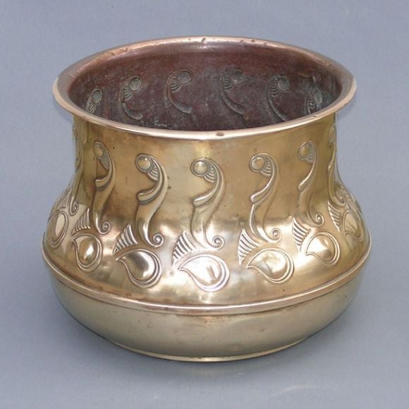 A large Art Deco period brass cache pot