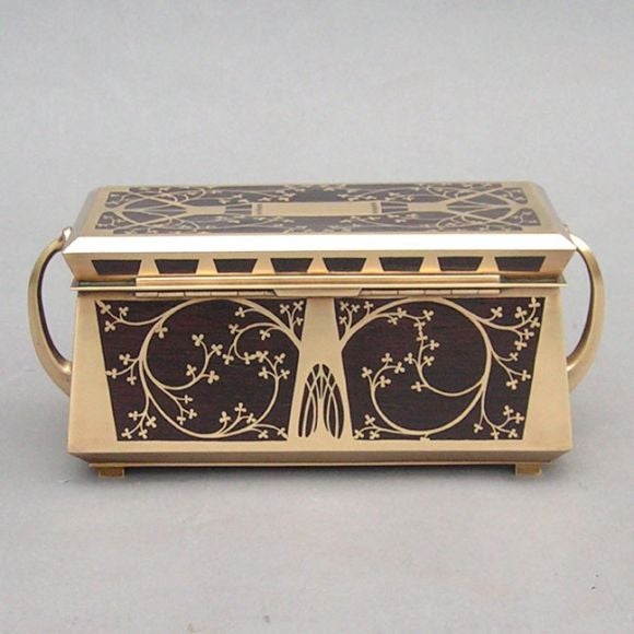 A Secessionist period box made by Erhard and Sohne having inlaid brass designs on a palisander wood ground. Southern Germany.  Original key.
