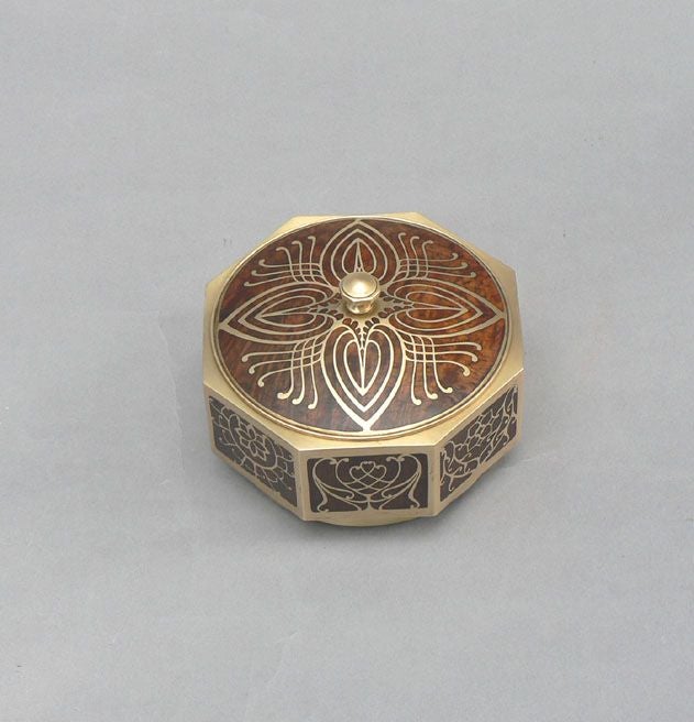 L7323<br />
A Secessionist period octagonal box made by Erhard and Sohne using palisander wood inlaid with brass.  Marked with Erhard hallmark.