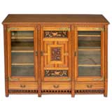 Antique An English Aesthetic period oak bookcase