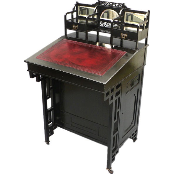 An English Aesthetic period desk.