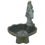Vintage Woman Pouring A Pitcher Fountain