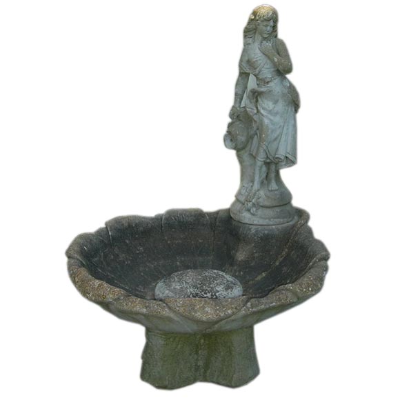 Woman Pouring A Pitcher Fountain
