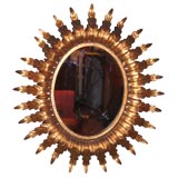 Oval Gilt Iron Sunburst Mirror
