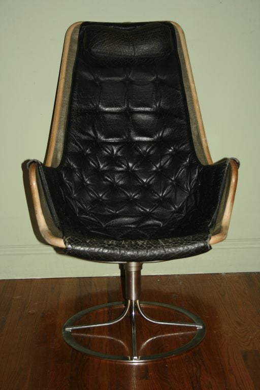 Dux chrome and leather swivel chair designed by Bruno Mathsson. Extremely comfortable. Sold as is.