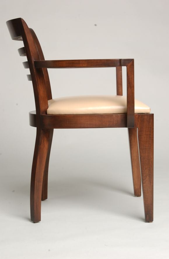 As with the other members of the collection designed for dining or as an occasional chair, the scale and proportion of the Eze have been thoughtfully determined to provide comfort without consuming space. The rung detail of the curved back and the