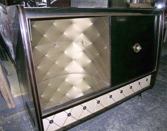 Beautiful record player console with sliding doors, glass shelves and upholstered panels<br />
<br />
<br />
<br />
<br />
<br />
Measurements<br />
Height: 2 ft. 11.5 in.<br />
Width/Length: 3 ft. 11 in.<br />
Depth: 1 ft. 4 in.<br