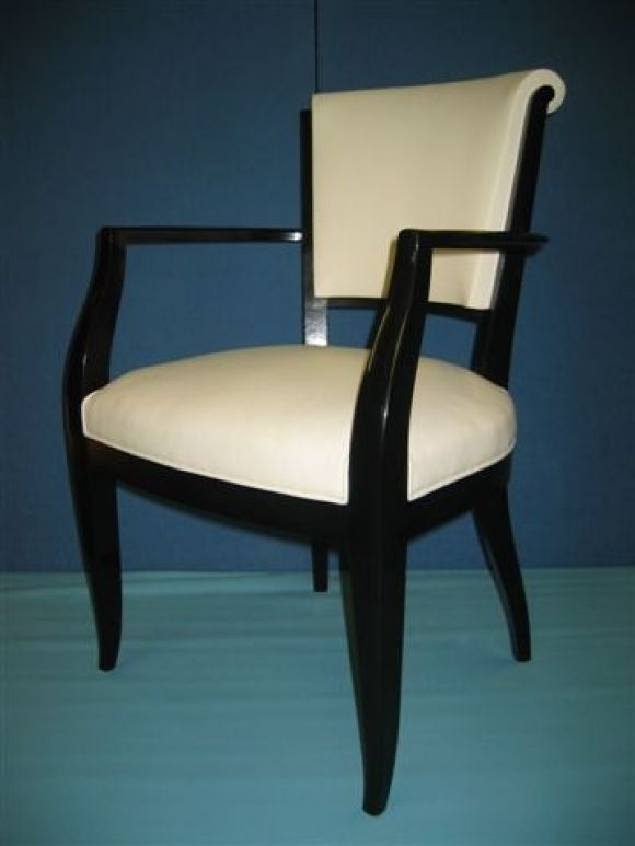 Elegant chairs fully refurbished and newly lacquered in high-gloss black upholstered in white leather.