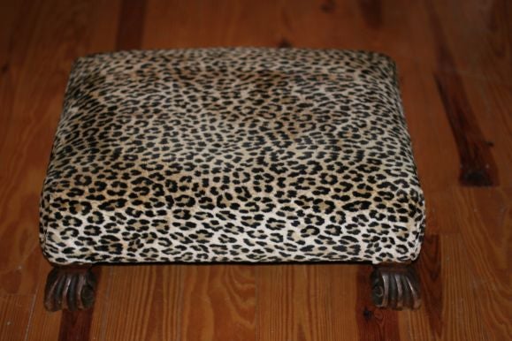 1930's reproductio footstool with claw feet and leopard print ultrasuede.  Can be made to order upon request.