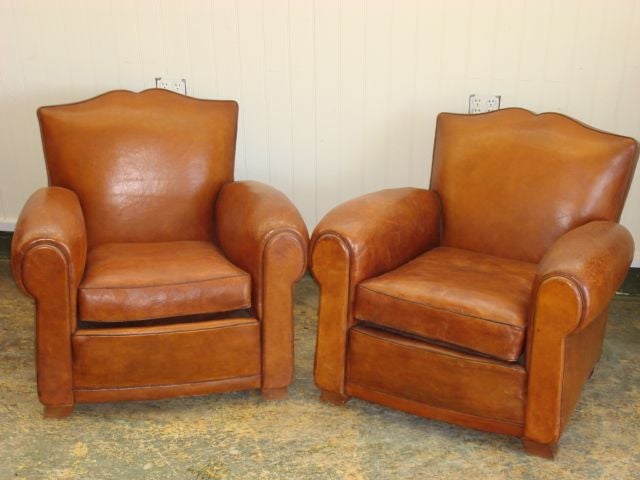 Pair of Antique Light Brown Leather Club Chairs with Rolled Arms and Contrast Welting, Mustache Back, French, Circa 1940,<br />
34