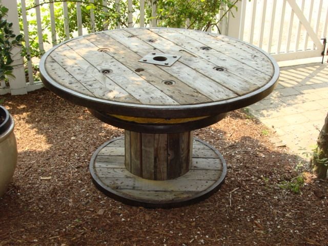 Antique Belgian Marine Cable Wood and Iron Spools Made Into Round Dining Table<br />
Unusual Double Stool Design with Iron Ring and Pedestal Base/55