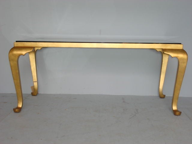 Glass and Glided Wood Coffee Table