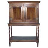 Two- Piece Bobbin Leg Cabinet with Carved Doors