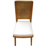 Eight Royere Cane Back Dining Chairs