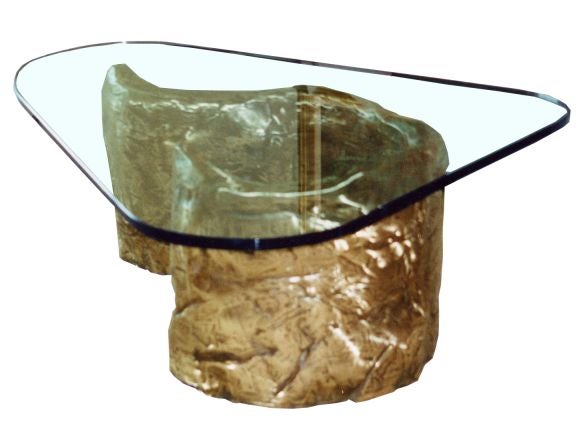 Cast bronze coffee table with glass top, custom sizes available. 

Measuring bronze base: 41" L x 21" W x 16 1/4" H.