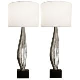 Pair of 1970
s Sculptural Chrome Lamps on Black Metal Bases