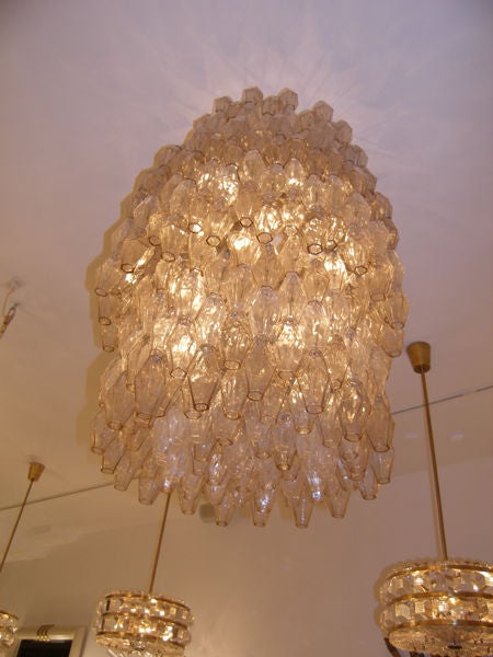 Large Venini polyhedral glass chandelier in champagne.<br />
<br />
Venini was founded in 1921 in the Italian glass making capital of Murano-- in truth an island in the waters surrounding Venice. Venini is still active to this day producing high