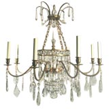 Circa 1920's 3Tiered 8 lite brass and crystal chandelier