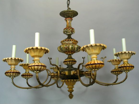 #1-157 Hand painted ceramic and ornately brass arms.8 light.