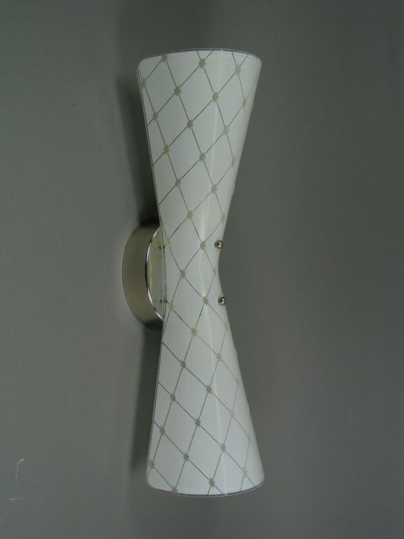 #2-605   Bowe tie sconce<br />
Priced individually<br />
Can be used horrizontally over a mirror