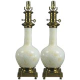 Pair white porcelain lamps with embossed overlay