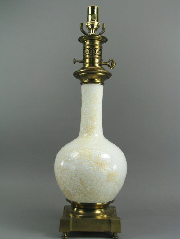 Pair white porcelain lamps with embossed overlay