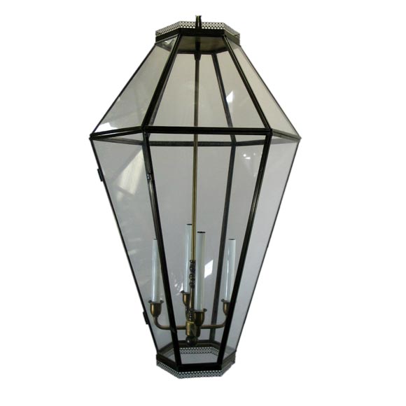 On sale #1-1856 large brass frame lantern with acrylic panels and four light cluster. Hinged door for bulb replacement.
Takes four 60 watt candelabra based bulbs.
Regular price $2800 sale price $1200 no additional discounts.