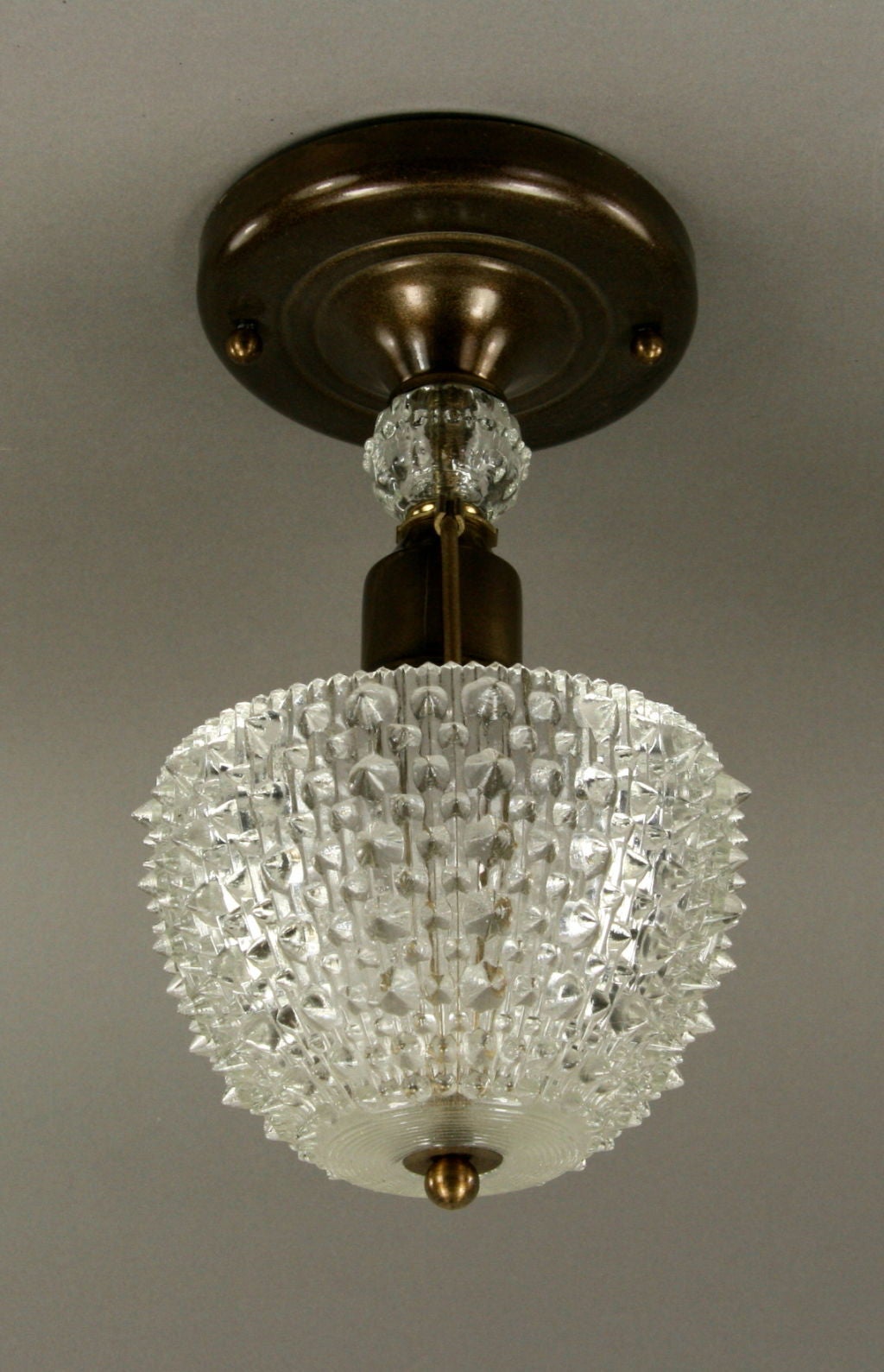 #1-2251, a dark brass and glass Italian flush mount fixture
Take one 75watt Edison based bulb.

