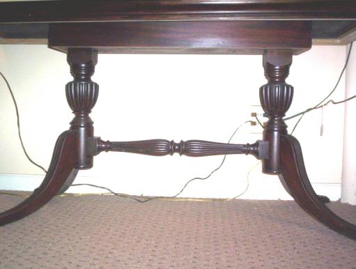 8-209Library table with burled top walnut brass claw feet