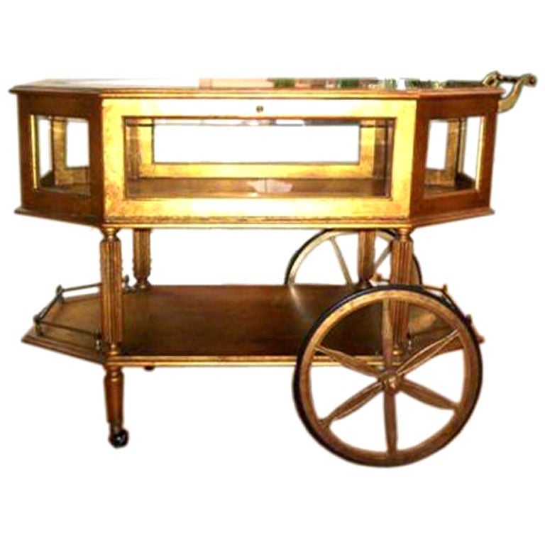 Circa 1940's Italian gilt rolling display case at 1stdibs