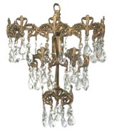 Circa 1940
s Three level scrolled brass Circa 1940
s Three level scrolled brass