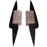pair  of black wood and glass pressed