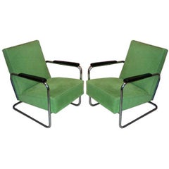 pair of arm chairs K 410 by Walter Knoll