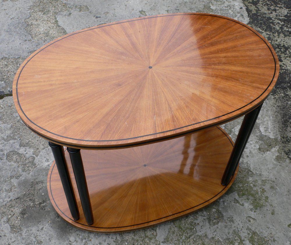 Sunburst cherrywood coffee table. Located in NY.