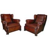 Vintage pair of  large wingback leather armchairs