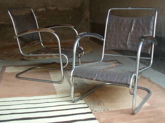 Original pair of tubular armchairs.