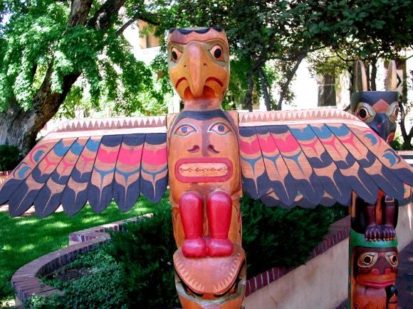 Hand carved set of three totem poles. Can be purchased individually.