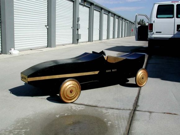 Sleek soap box derby car named 