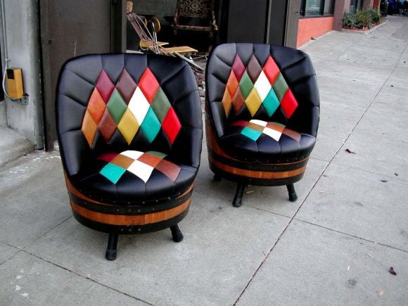Terrific pair of harlequin patterned swivel chairs fashioned from a Kentucky whiskey barrel.