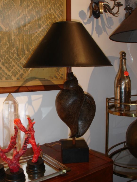 Pair of carved wood shell lamps