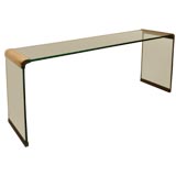 Brass and glass waterfall console.