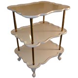 Three tiered lacqured table.