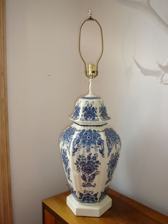 A grand scale glazed pocelain lamps in the Delft style